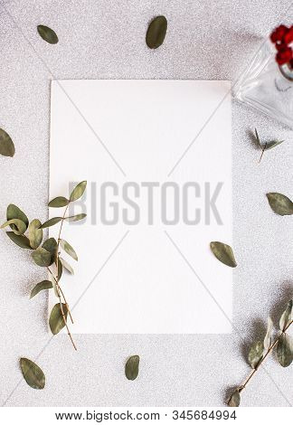 Background With Copy Space Blank On White Table With Glitter Heart, Eucalyptus Branch, Flowers And L