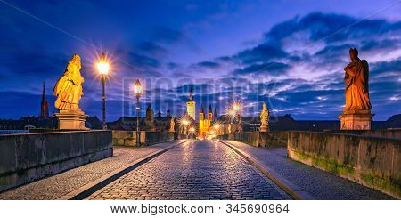 Old Main Bridge, Alte Mainbrucke With Statues Of Saints, Cathedral And City Hall In Old Town Of Wurz