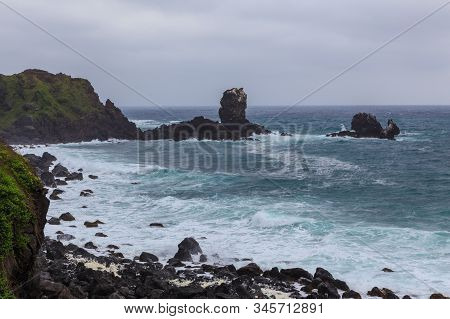 Beautiful Nature Sea Landscape Scene With Black Stone Of Jeju Island, South Korea
