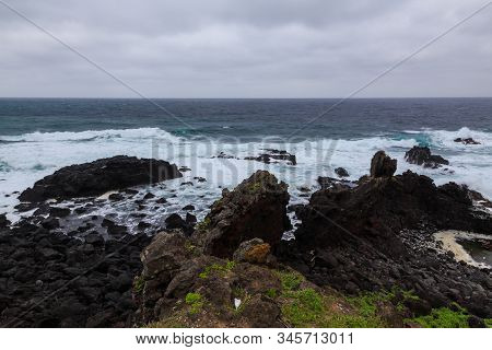 Beautiful Nature Sea Landscape Scene With Black Stone Of Jeju Island, South Korea