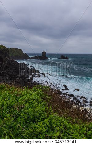 Beautiful Nature Sea Landscape Scene With Black Stone Of Jeju Island, South Korea