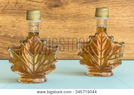 Maple Syrup In A Bottle Maple Leaf Shape. Suovenir From Canada.