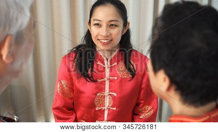 Chinese Family Happy Together In Chinese New Year Gathering Event
