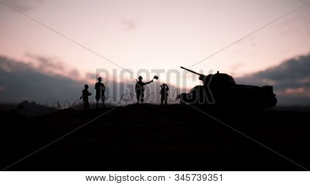 War Concept. Military Silhouettes Fighting Scene On War Fog Sky Background, World War German Tanks S