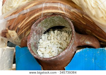 Armenian Traditional Cheese Yeghegnadzor On Market In Yerevan. Loose Curd Mass, Kept In Clay Pots An