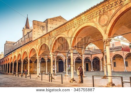 Couple In Italy Admire Bologna Architecture Archway Of Santa Maria Dei Servi Or Santa Lucia In Bolog