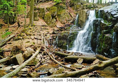 Skakalo Waterfall In The Carpathian Mountains Surrounded By Forest On A Spring Sunny Day