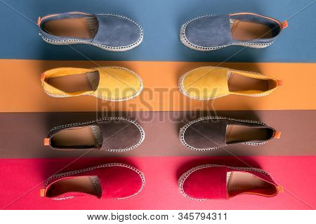 Flat Lay Of Loafers Shoes On Multicolor Background.