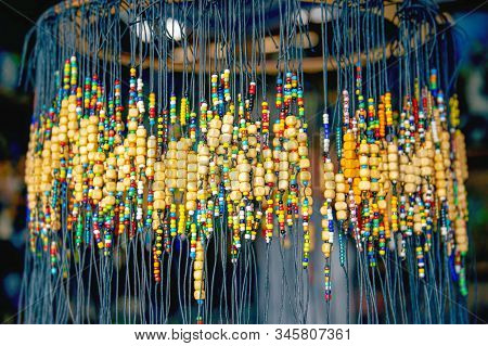 Large Number Of Bright Colored Baubles And Occult Charms Made Of Wood For The Body, Charms For The H
