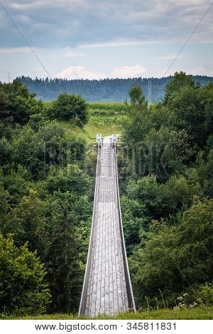 Suspension Bridge St. Luzia On The Bicycle Track Drauradweg Between Bleiburg And Neuhaus Near The Vi
