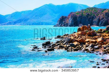 Coast Of Capo Pecora Beach In Mediterranean Sea Sardinia Reflex
