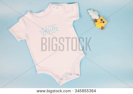 Flay Lay Of Blue Baby Bodysuit For Baby Boy Isolated On Blue Colored Background, Baby Shower, It’s B