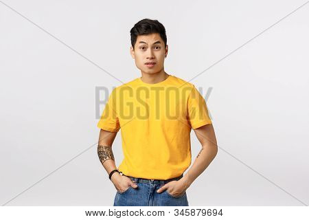 Surprised Handsome Asian Male Model Didnt Expact Someone Saying Rude Offensive Words, Raise Eyebrows