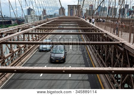 New York, Usa - June 21, 2019:  Road Traffic Over Brooklyn Bridge.
