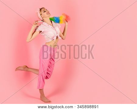 Happy Girl Holds Colorful Duster Brush. Woman With Cleaning Sweep. Cleaning Woman. Cleaning Service.