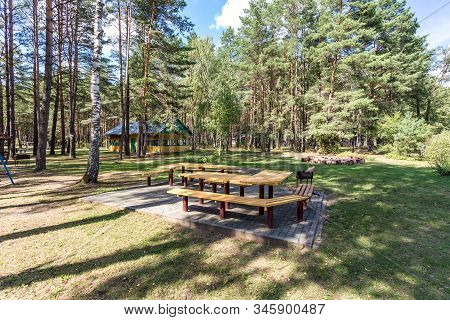 Wooden Camping Arbors  With All Conviniences In A Pine Forest