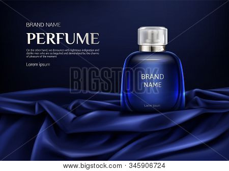 Perfume Bottle On Silk Folded Fabric Background. Glass Flask With Dark Blue Liquid, Packaging Design