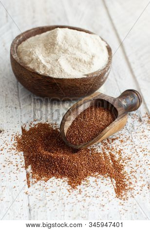 Teff Flour In A Bowl And Teff Grain With A Spoon Close Up