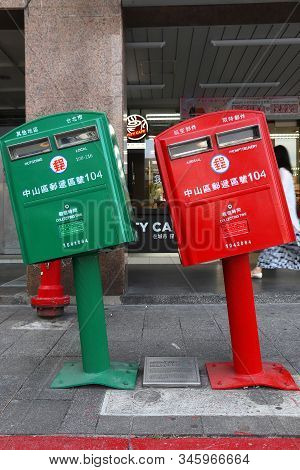 Taipei, Taiwan - December 4, 2018: Mailboxes Bent During Typhoon In Taipei, Taiwan. The Twisted Mail