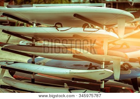 Outdoor Mobile Stand With Surf Surfboards And Windsurfing For Beginners In School