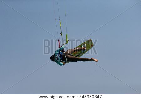 Kitesurfing on the waves of the Red sea, Egipt. Kitesurfing, Kiteboarding action photos Kitesurfer In action 