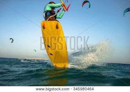 Kitesurfing on the waves of the Red sea, Egipt. Kitesurfing, Kiteboarding action photos Kitesurfer In action 