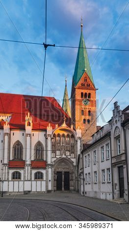 Romanesque Augsburg Cathedral (Augsburger Dom), one of the city's main attractions as ssen from the Frauentorstrasse, Augsburg, Swabia, Bavaria, Germany
