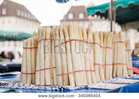 Raw white asparagus for sale at local market in Bavaria Germany - a popular vegetable during Spargel season (Spargelzeit or Spargelsaison)