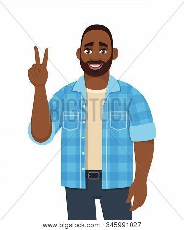 Trendy Young African American Man Showing Victory, Peace, V Or Winning Gesture. Person Making Two Si