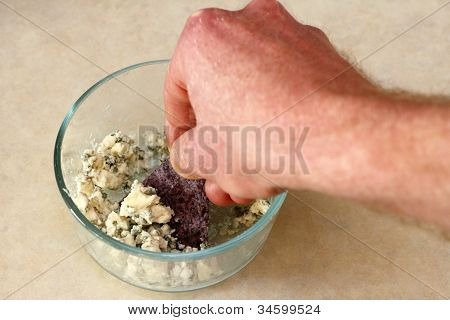 Scooping Blue Cheese Onto Blue Corn Chip