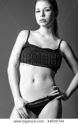 Studio Fashion Shot: Beautiful Girl Wearing Panties And Shirt. Black And White