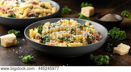 Fusilli Pasta With Bacon, Kale And Parmesan Cheese. Healthy Food