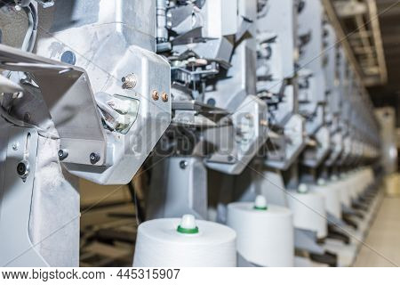 White Textile Yarn Warping Machine. Machinery And Equipment In The Textile Factory.soft Focus.
