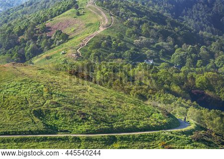 Hill Walkers In The Distance, Enjoying The Malvern Hills, On A Summer Morning Stroll.