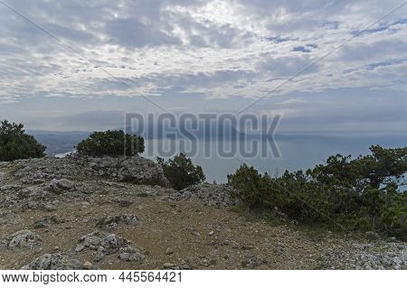 View From The Top Of Cape Alchac To Cape Megan, Partially Hidden By Clouds. Sudak, Crimea. Cloudy, B