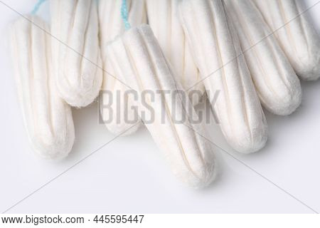 Medical Female Tampon On A Pink Background. Hygienic White Tampon For Women. Cotton Swab. Menstruati
