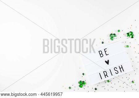 Lightbox With Saint Patricks Day Greeting And Shamrocks Of Green Glass Hearts