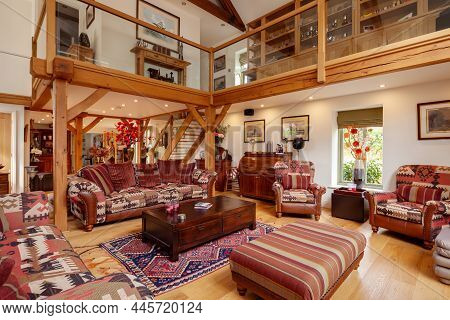 Abbotsley, Cambridgeshire - 24 July 2018: Living Room And Lounge With Tall Ceiling And Indoor Galler