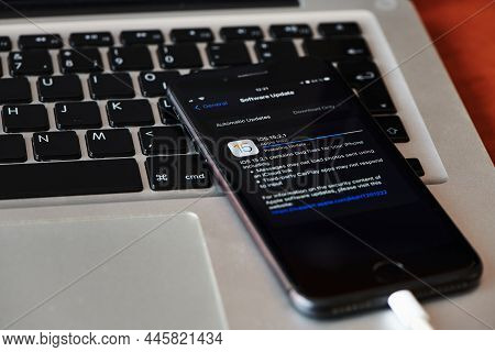 Moscow, Russia 01.13.2022: Old Black Iphone Smartphone Is Installing New System Software Update. New