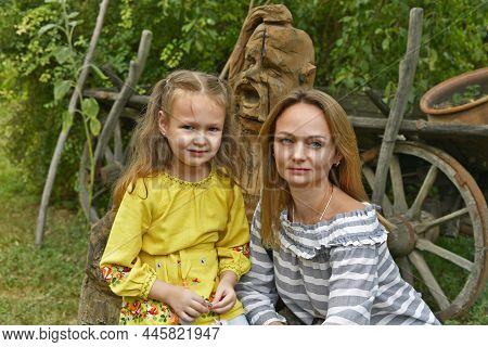 A Beautiful Adult Woman And Her Little Daughter At The Sorochinskaya Fair.