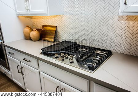 Kitchen Counter Top With Gas Cook Top And Decorator Items