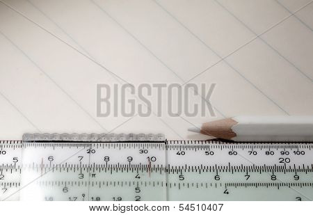 Copybook, exercise book, slide rule and colored pencils. HDR.