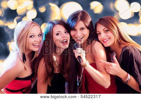 Four Beautiful Girls Singing Karaoke