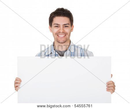 Smiling Casual Man With Blank Sign