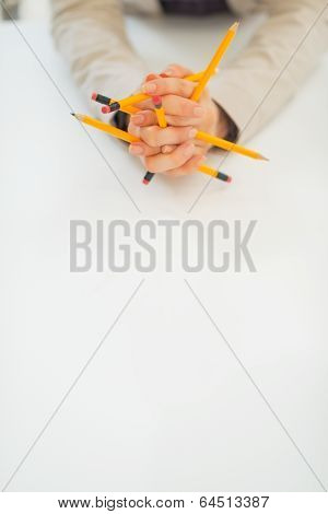 Closeup On Business Woman Holding Pencils