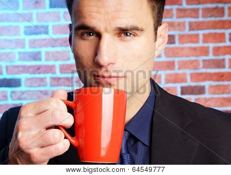 Businessman with cop of coffee