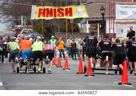 Two Teams Race Beds To Finish Line In Fundraiser Race