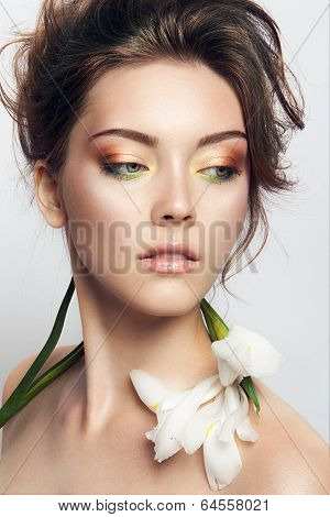 Close-up studio portrait of beautiful woman