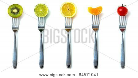 Fruits On Fork Isolated On White Background