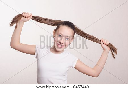 Portrait Girl Of Twelve In A Positive Mood